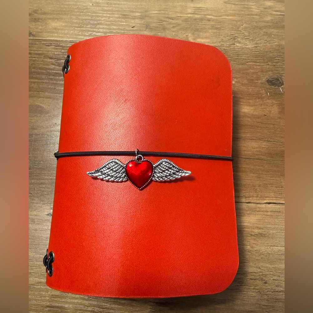 Red Leather Journal cover with Winged Heart Charm.